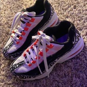 orange , white , and black bikes